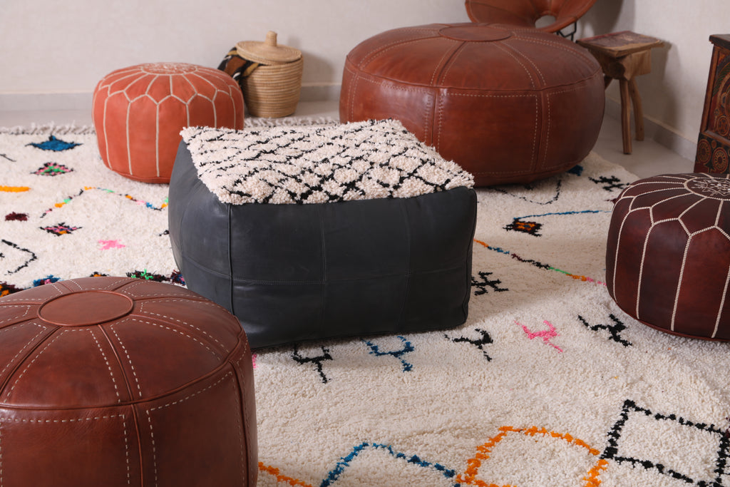 Importance of MOROCCAN POUFS WITH BERBER RUGS AT HOME DECOR