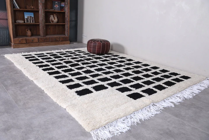 Beni Ourain rugs are woven by Berber women on vertical looms