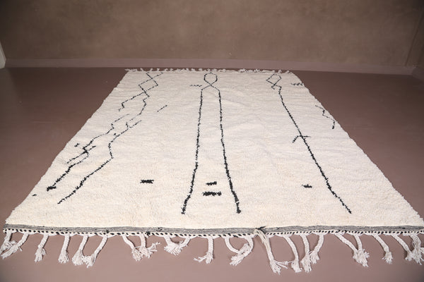 Custom white Moroccan rug with black striped patterns – Handwoven wool design