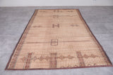 Vintage handmade tuareg rug 5.6 X 9.4 Feet