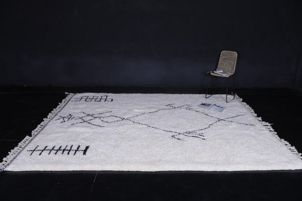 Handmade Moroccan beni ourain rug – White wool with black geometric symbols