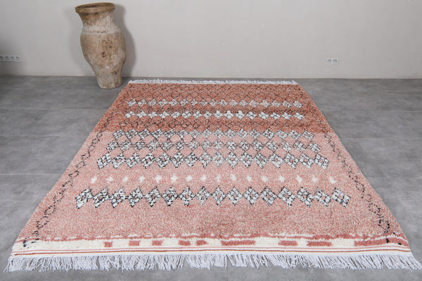 Handcrafted brown rug with berber-inspired design