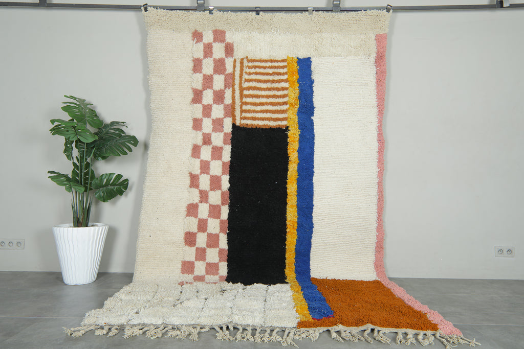 Moroccan Wool Rug 6.6 x 10.6 ft – Handmade Berber Carpet with Ivory Base, Checkerboard Pink, Black Stripe, Blue & Orange Accents