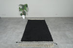 Midnight Black Moroccan Wool Rug – 4.6 x 7.2 ft Handwoven Minimalist Style