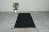 Midnight Black Moroccan Wool Rug – 4.6 x 7.2 ft Handwoven Minimalist Style