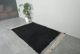 Midnight Black Moroccan Wool Rug – 4.6 x 7.2 ft Handwoven Minimalist Style