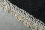 Midnight Black Moroccan Wool Rug – 4.6 x 7.2 ft Handwoven Minimalist Style
