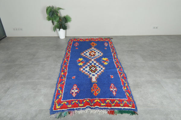 Blue vintage Moroccan runner rug with vibrant geometric patterns - 3.9 ft x 8.8 ft
