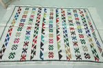 Handwoven White Moroccan Rug with Colorful Patterns – 3.2 FT x 5.1 FT