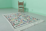 Handwoven White Moroccan Rug with Colorful Patterns – 3.2 FT x 5.1 FT