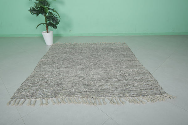 Handcrafted Moroccan rug – Neutral gray textured design & tassels | 5.9 FT x 6 FT