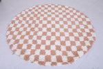 Round moroccan rug - feet beige rug