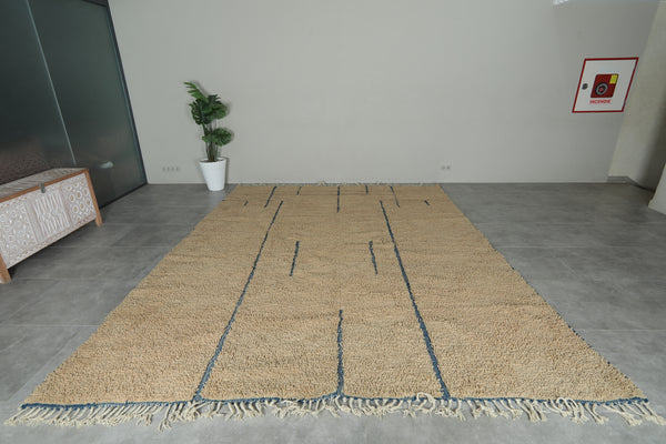Handmade beige Moroccan wool rug with blue lines – Custom size