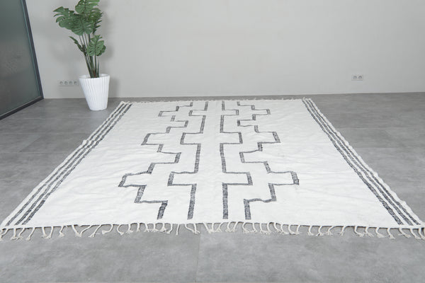 Handwoven wool Moroccan rug with geometric black patterns - Custom sizes