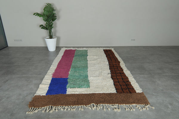 Colorful Moroccan wool rug with white base and striped design - 5.9 ft x 9.5 ft