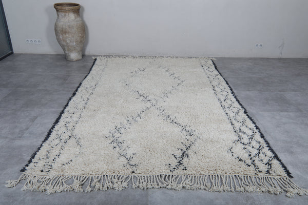 Creamy custom Moroccan rug with black patterns