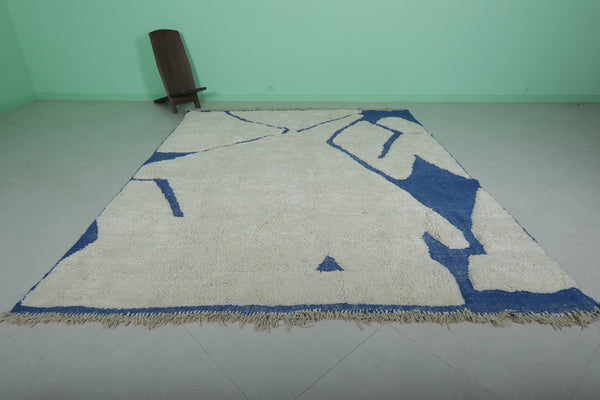 Hand-knotted Moroccan rug 7.9 ft x 10.3 ft | Unique geometric design with blue and white