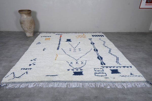 Custom white Moroccan rug with berber colorful patterns