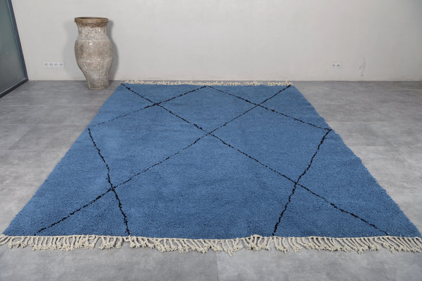 Blue custom Moroccan rug with black patterns