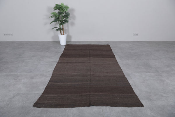 Handmade Moroccan berber rug – 4.2 FT x 9.2 FT | Dark earth tones