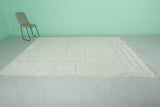 Handmade 6.9 FT x 10 FT Moroccan Wool Rug - Minimalist Patchwork Design