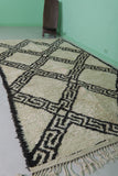 5.7 x 10.3 FT Moroccan Wool Rug – Bold Black Geometric Pattern