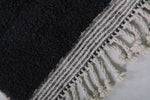 2 x 3 ft Black Moroccan Wool Rug with White Fringe Border