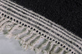 2 x 3 ft Black Moroccan Wool Rug with White Fringe Border