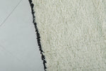 Minimalist Moroccan Rug with Black Border – 5.2 x 6.6 ft, Handwoven Ivory