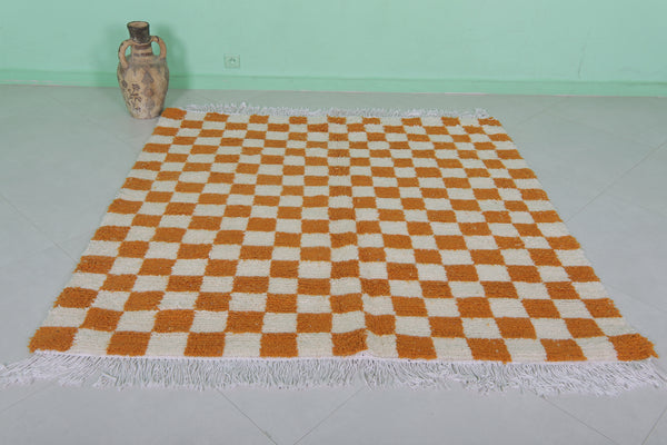 Handmade Moroccan checkered rug – 5.7 x 5.5 ft, burnt orange & white
