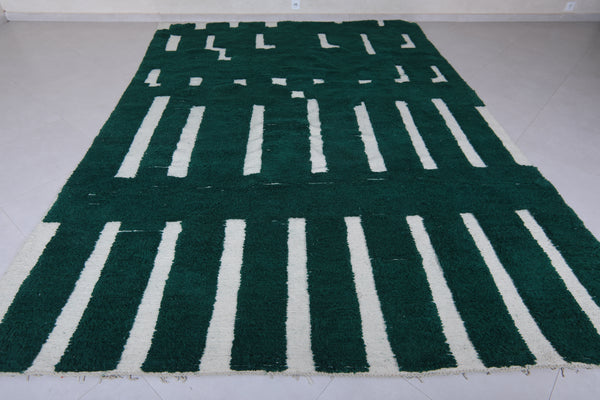 Vibrant green Moroccan rug with striking white stripes