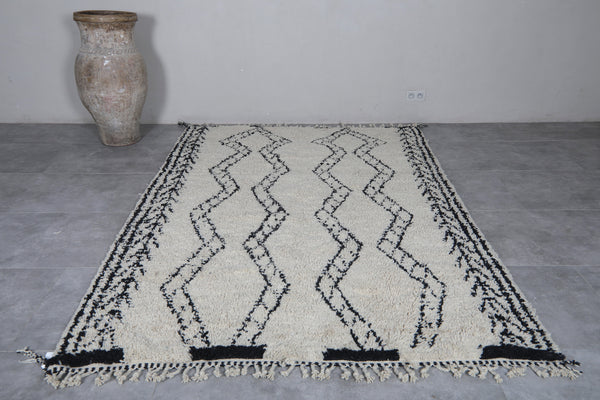 Custom size creamy wool rug with black pattern