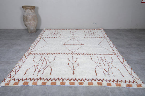 Custom white Moroccan rug with brown tribal patterns