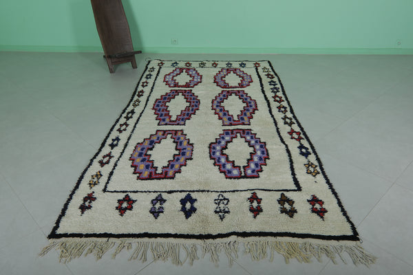 5.1 x 9.7 ft Moroccan rug – Handwoven wool with colorful geometric motifs