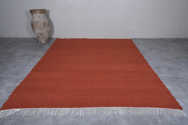 Flatwoven custom brown Moroccan rug for modern interiors