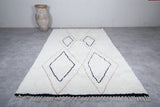 Elegant White Wool Moroccan Rug with Unique Patterns