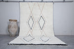 Elegant White Wool Moroccan Rug with Unique Patterns