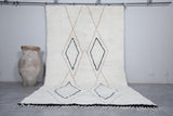 Elegant White Wool Moroccan Rug with Unique Patterns