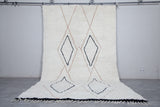 Elegant White Wool Moroccan Rug with Unique Patterns