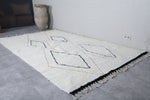 Elegant White Wool Moroccan Rug with Unique Patterns