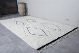 Elegant White Wool Moroccan Rug with Unique Patterns