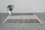 Handwoven Moroccan rug 4.9 FT × 7 FT