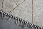 Elegant White Wool Moroccan Rug with Unique Patterns