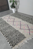 Handwoven Moroccan rug 4.9 FT × 7 FT