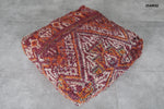 Handwoven Moroccan Floor Cushion – Rust & Burgundy Wool Pouf