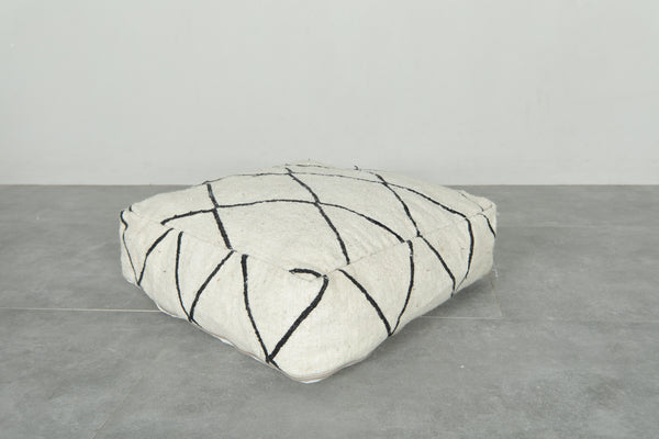 Minimalist white and black Moroccan kilim pouf