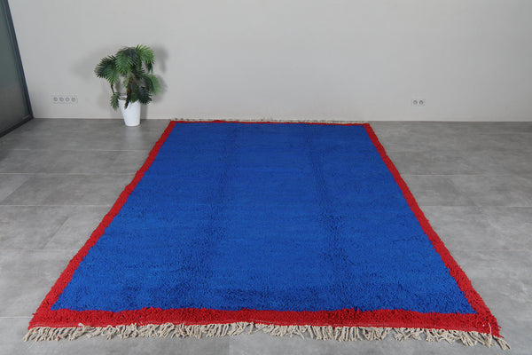 Blue Moroccan Berber Rug 7.4 x 11.2 ft – Handmade Wool Area Rug with Red Border
