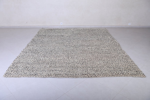 Elegant custom beige rug with black dotted details