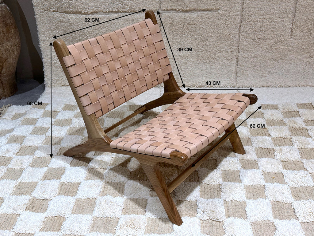 Tan Moroccan lounge chair – Handwoven leather & wood accent chair for modern interiors
