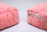 Two moroccan handmade berber rug old pink poufs
